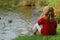 Girl feeding ducks