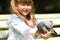 Girl Feeding Pigeon