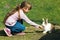 Girl feeding rabbit