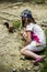 A girl feeding a red squirell in the forest, Skole Beskids National Nature Park, Ukraine