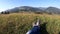 Girl feet grass mountain landscape