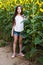 Girl on the field of sunflowers