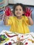 Girl Finger Painting In Art Class