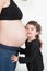 girl first daughter listen pregnant mother belly