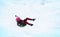 girl flies on a slide from an ice hill