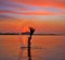 Girl flipping hair flip at sunset beach