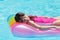 Girl floating on airbed