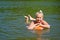 Girl floating in the river