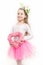 Girl with flower in long blond hair and skirt tutu