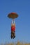 Girl flying with red umbrella