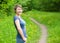 Girl on a forest path road