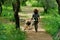 Girl in the forest walks with her beloved dog