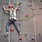 Girl in a free climbing wall