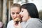 Girl friends eat blueberry muffin in paris, france