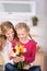 Girl Giving Flowers To Mother On Mother\'s Day