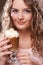Girl with glass of coffee witn cream
