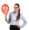 Girl in glasses with red inflated ball