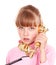 Girl with gold retro telephone.