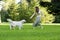 Girl with the golden retriever in the park