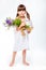 Girl in gown with bouquet and Teddy