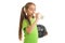 Girl in green shirt with soccer ball in hands drinks water