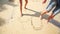 Girl Guy Feet Barefoot Draw Heart on Sand Beach at Wave Edge