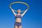 Girl gymnast with a hoop exercise