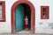 Girl in Half timbered house in a village in Alsace