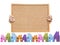 Girl hand holding cork board with colorful house model isolate on white background