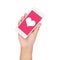 Girl hand holding mobile phone display heart on pink screen
