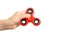 girl hand holding popular fidget spinner toy