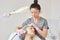 Girl has facial treatment. Beautiful woman receiving ultrasound cavitation peeling in beauty salon. Skin cleansing procedure with