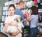 girl with havanese pup while shopping with parents
