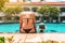 Girl without head near the pool. Funny photo