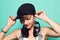 Girl with headphones and positive attitude. Woman with smiling music headphones