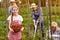 Girl helping in picking tomatoes