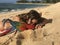 Girl and her Macaw at the beach