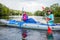 Girl with her mother kayaking