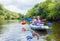 Girl with her mother kayaking