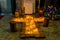 A girl with her parents is lighting candles inside of St. Peter`s Church in Hamburg, a Protestant cathedral since the Reformation