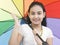 Girl with her rainbow umbrella