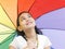 Girl with her rainbow umbrella