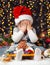 Girl hide face in christmas decoration with gift, dark background with illumination and boke lights, winter holiday concept