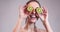 Girl Hiding Her Eyes with Kiwi Slices