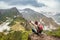 Girl-hiker looking on top of Huayna Picchu, looking on Machu Picchu