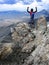 Girl hiker summit mountain top