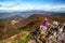 Girl hiker on top of the hill Klak in Slovakia