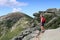 Girl hiking in mountains