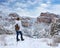 Girl hiking in the mountains on winter trip in Colorado mountains.