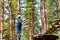 Girl on hinged trail in extreme rope Park